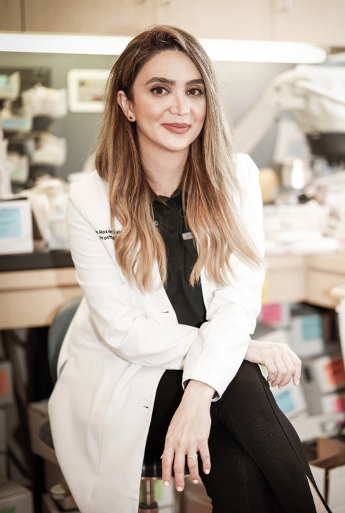 Dr. Roxanne Salavati smiling in the dental office during a patient-focused portrait