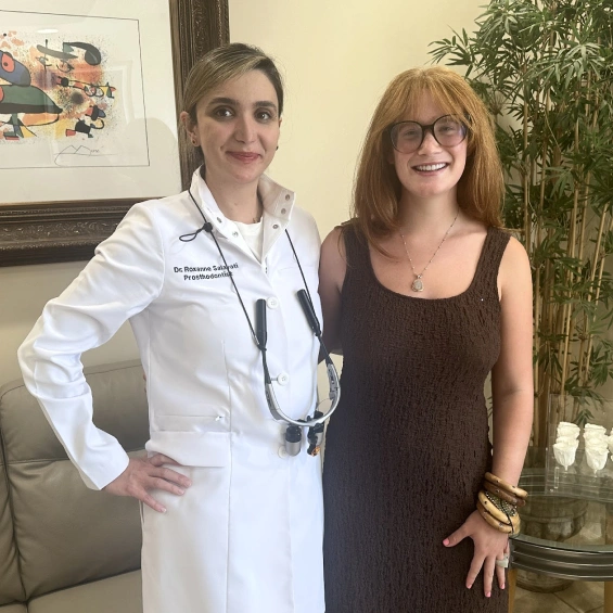 Dr. Roxanne Salavati with a patient, providing compassionate and personalized dental care