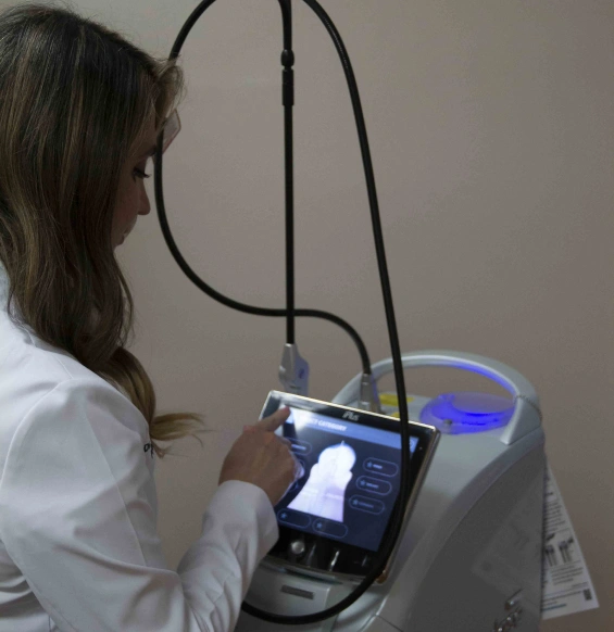 Patient receiving a comprehensive dental cleaning and oral examination