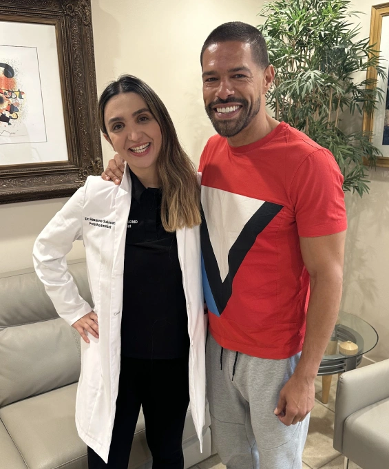 Dr. Roxanne Salavati with a patient after holistic dental treatment