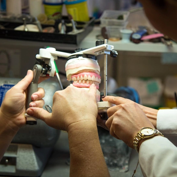 Dentist performing advanced dental treatment with precision and modern technology